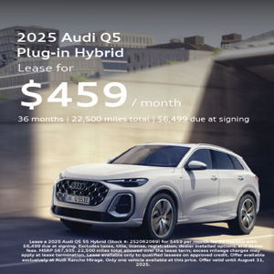 Angle view of 2025 Audi Q5 Plug-in Hybrid driving 